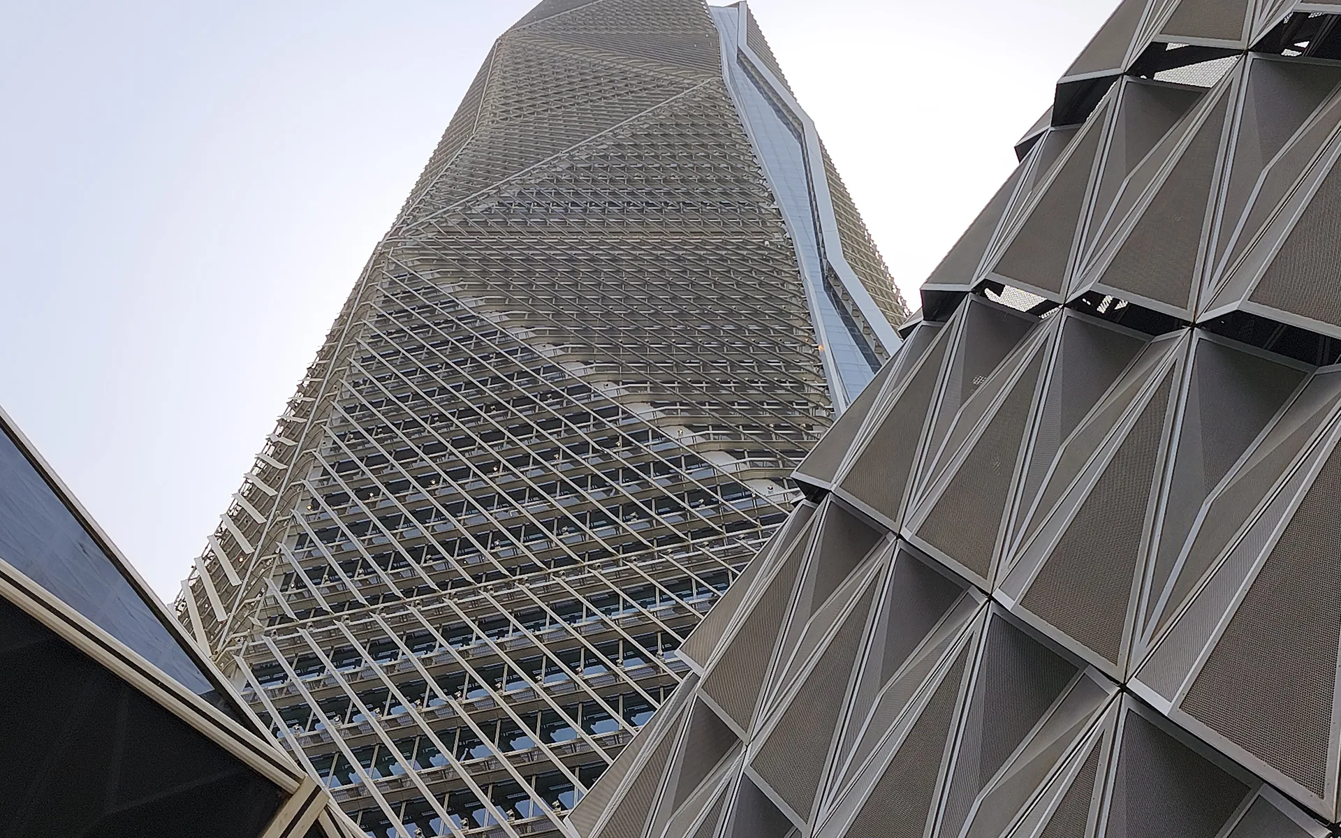 Upward view of a faceted King Abdullah Financial District tower, Riyadh